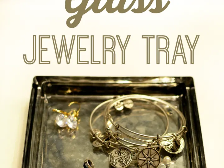 Make your own mercury glass jewelry tray in a few easy steps with looking glass paint and a candle plate.