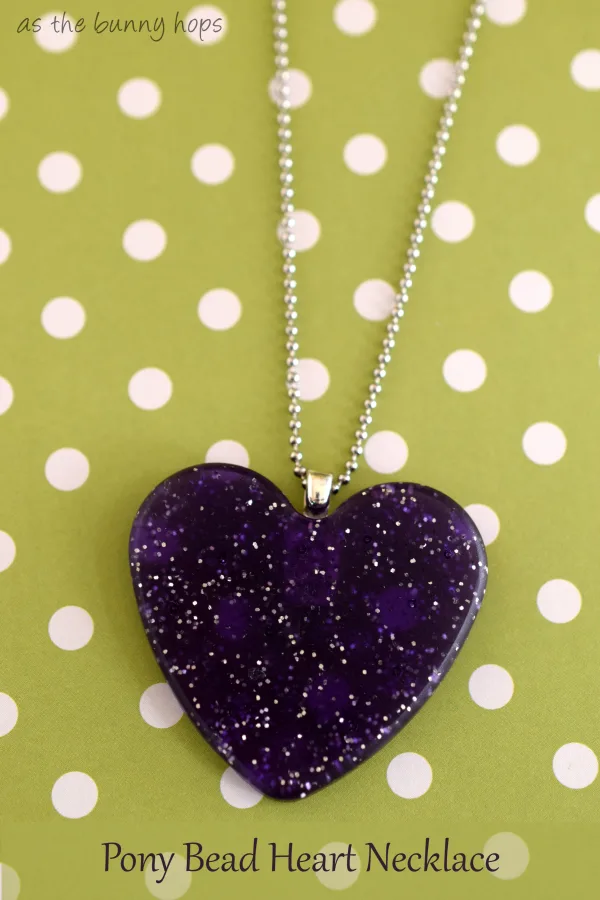 Easy to make heart necklace with glue on bail. Heart is made from pony beads! 