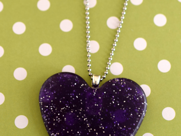 Easy to make heart necklace with glue on bail. Heart is made from pony beads!