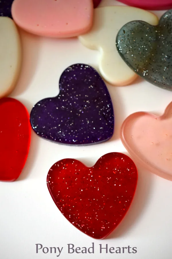 Make easy and fun plastic hearts from Pony Beads! They're a great start to your Valentine's Day crafting projects!