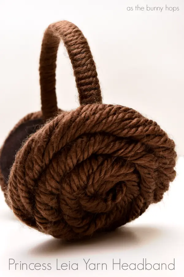 This fun and easy to make Princess Leia yarn headband takes less than 15 minutes to make and costs less than $5! 