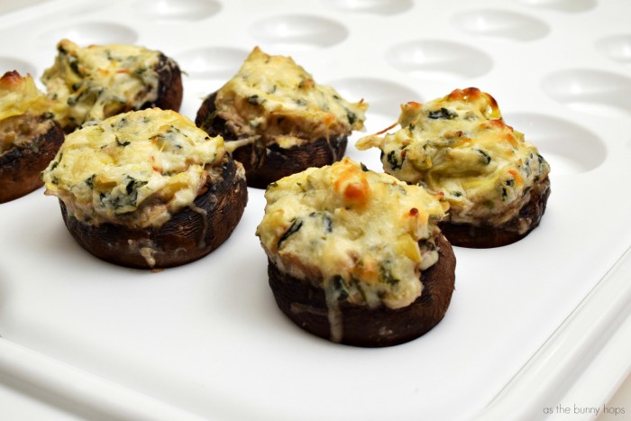 I can never get enough stuffed mushrooms! These spinach artichoke stuffed mushrooms are sure to be a hit at your next gathering. 