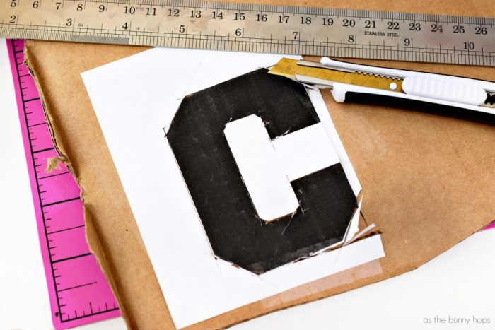 Make your own sports-themed nursery letters with cardboard and scrapbooking paper! 