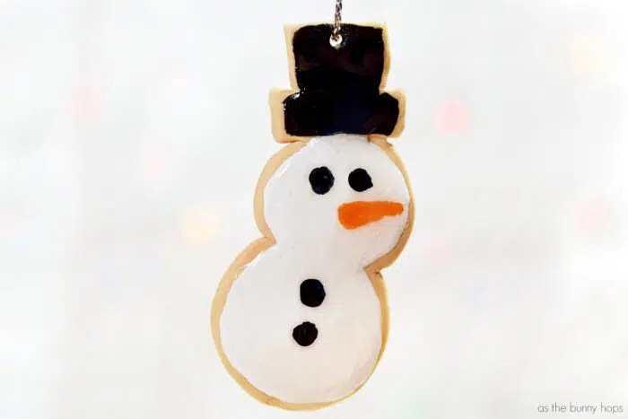 Enjoy a calorie-free treat when you make adorable snowman sugar cookie ornaments from polymer clay! 