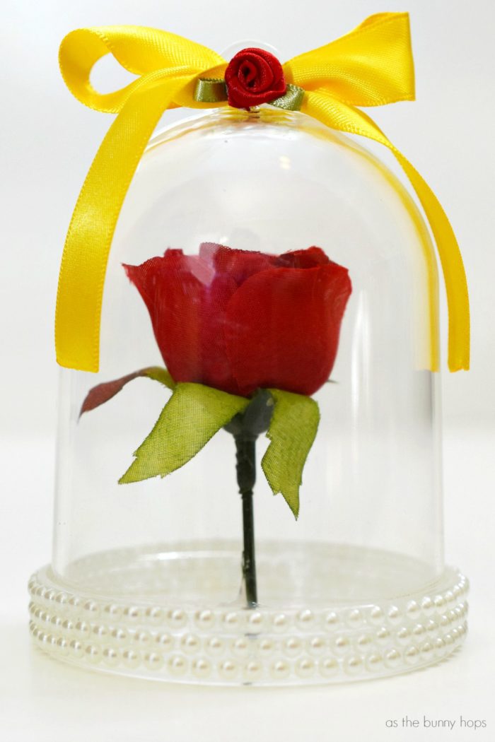 It only takes a few minutes to make a Beauty and the Beast-inspired Enchanted Rose Ornament! It's an easy DIY Disney ornament craft for all ages! 