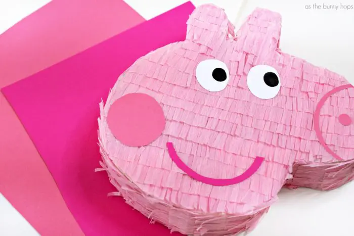 Peppa Pig Piñata and Cardstock: Make your own Peppa Pig Piñata with these easy to follow instructions and Peppa Pig template! It's the perfect party decor for a Peppa Pig birthday party theme!
