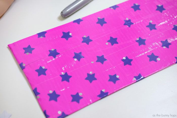 Color on pencil case with silver Sharpie marker. Head back to school with a DIY pencil case inspired by American Girl's WellieWishers. 