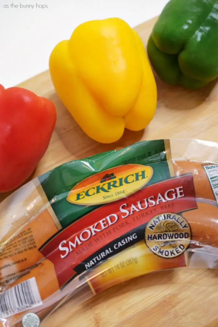 Eckrich Smoked Sausage on Cutting Board with Peppers