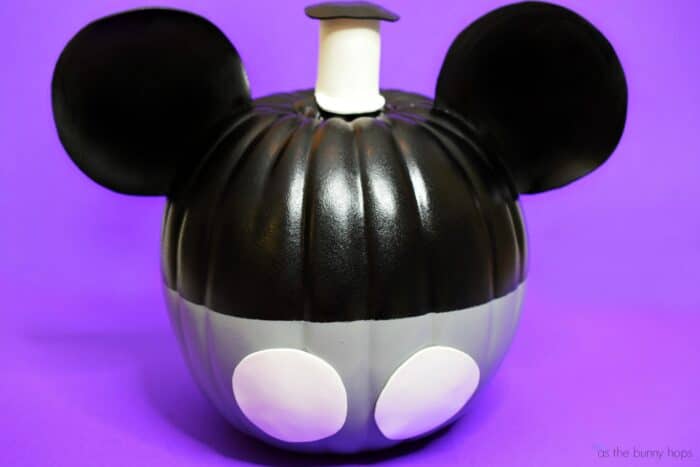 This DIY Steamboat Willie Pumpkin celebrates MIckey Mouse's debut film role! Get full instructions for this easy Disney craft along with tons of other no-carve pumpkin inspiration for your Halloween at As The Bunny Hops!