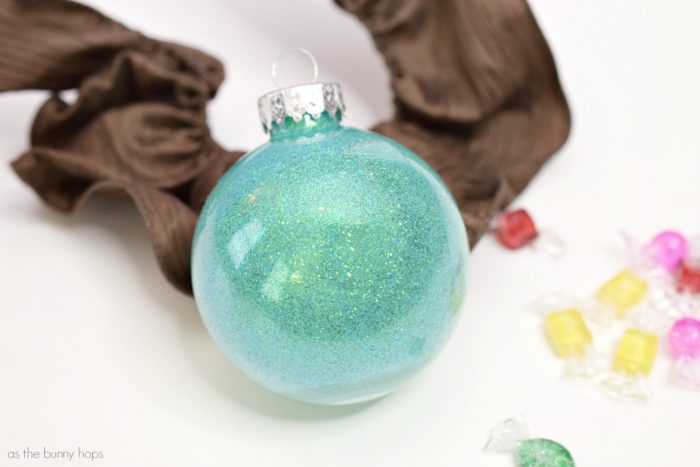 This glittery Vanellope von Schweetz Ornament is the perfect addition to your glittery princess ornament collection! Get the instructions for this easy DIsney DIY and lots of Christmas craft inspiration at As The Bunny Hops! 