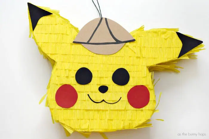 Excited about Detective Pikachu? Celebrate the adorable little Pokémon's big screen feature with a super cute Detective Pikachu Piñata! It's perfect for a Pikachu birthday party. Pika pika! 