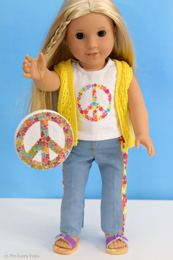 Add a groovy touch to your tree with this American Girl Julie Christmas Ornament! 
