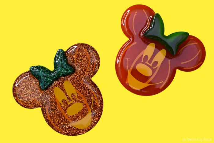 Minnie Mouse Jack-O-Lantern PopSocket with yellow background. 