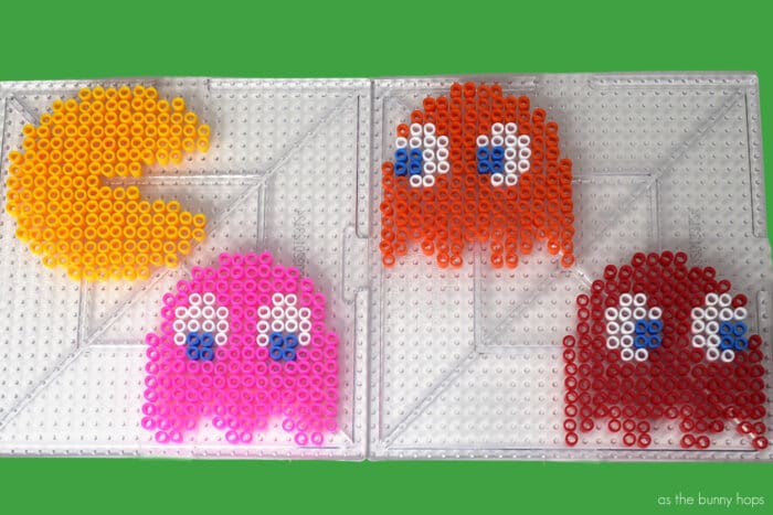 Make some totally cool 80s-inspired perler bead Pac-Man Christmas Ornaments! 