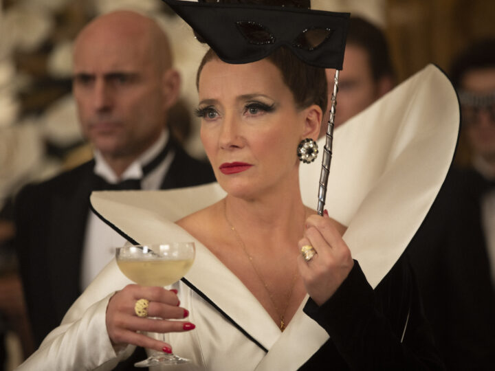 (L-R): Mark Strong as John the Valet and Emma Thompson as the Baroness in Disney’s live-action CRUELLA. Photo by Laurie Sparham. © 2021 Disney Enterprises, Inc. All Rights Reserved.